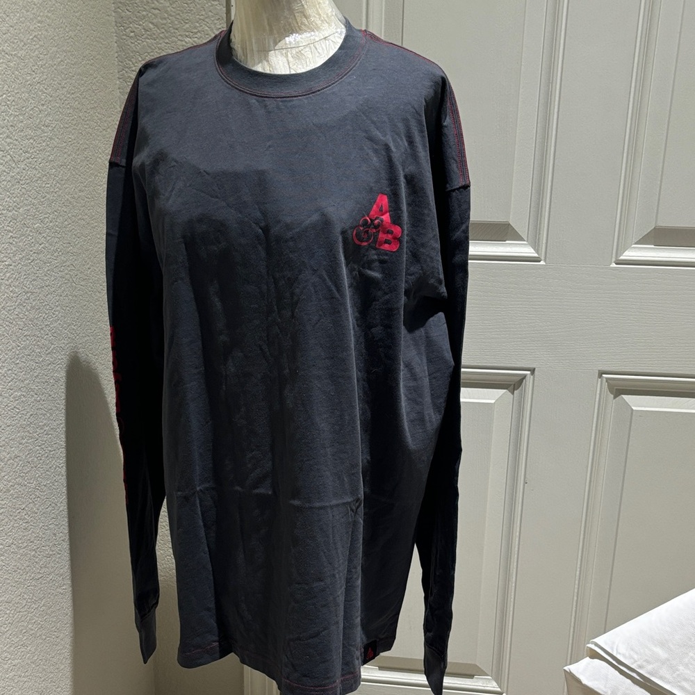 Men's Black ABOVE & BEYOND Long Sleeve Shirt with Red Accent